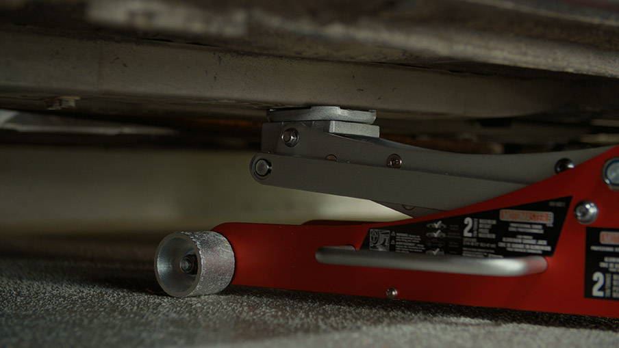 Lower the Vehicle and Tighten Lug Nuts
